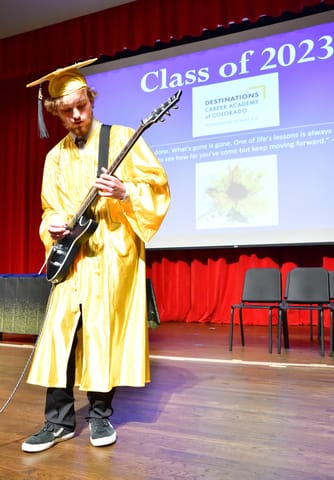 Boy playing a guitar