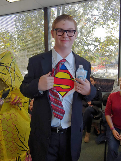 Super Man costumed boy in the fall festival